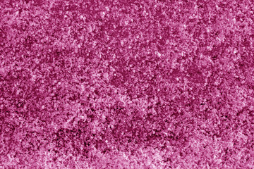 Frost on car glass texture in pink tone.