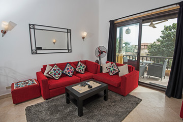 Interior design of luxury apartment living room with corner sofa