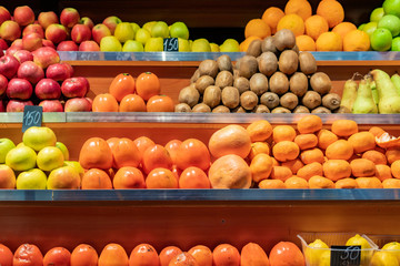 fresh organic fruits on the stall in public market b