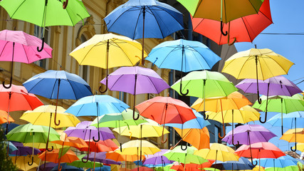 Fototapeta na wymiar Street Decorated With Rainbow Color Umbrellas, Belgrade, Serbia