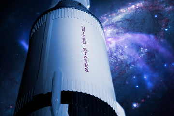 usa rocket spacecraft in outer space. blue gradient b. Elements of this image furnished by nasa