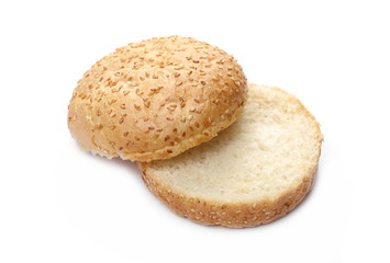 Burger bun with sesame isolated on white background