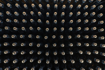 Pattern of sparkling wine bottles seen from above - 245886406