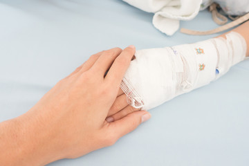 Little boy get sick from influenza need to be admitted to hospital with saline intravenous (iv) ...