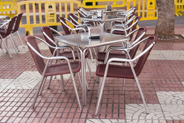 Cafe, coffee shop, tavern and restaurant concept - Empty tables in between dining hours in Europe town.