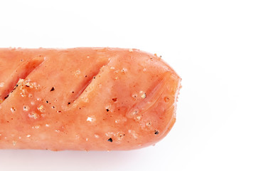 塩と胡椒のついたソーセージ