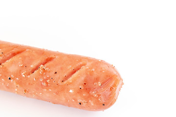 塩と胡椒のついたソーセージ