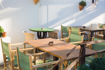 Cafe, coffee shop, tavern and restaurant concept - Cafe on the street of old European city.