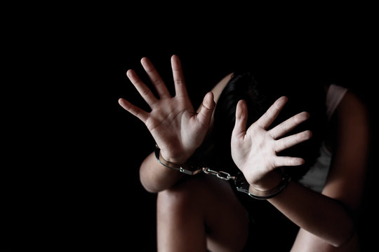 Child Hands In Handcuffs, Stop Violence Against Children, Human Trafficking Concept,