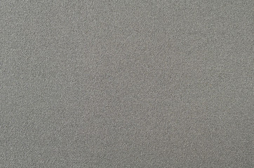 Fototapeta na wymiar Rough texture of sandpaper. sandpaper background with vertical stripes.