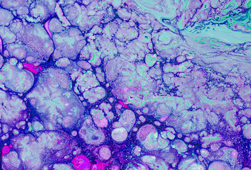 close up curlicue of acid Paints. Abstract background.