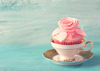 Cupcake with pink flowers
