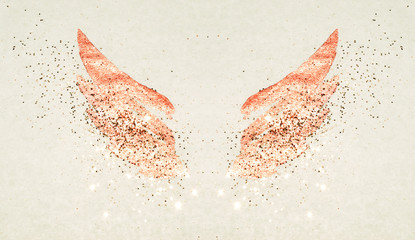 Golden glitter on abstract pink watercolor wings in vintage nostalgic colors.