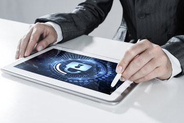 Internet security concept with woman working on media screen with stylus