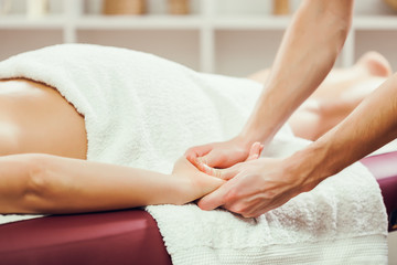 Young woman is having massage on spa treatment. 