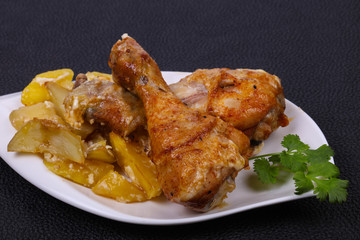 Roasted chicken legs with potato