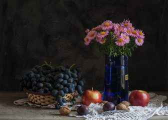 Still life with fruits and asters