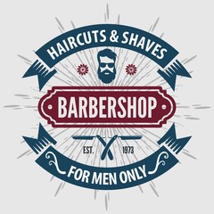 Barbershop vintage label, badge, or emblem on gray background. Vector illustration