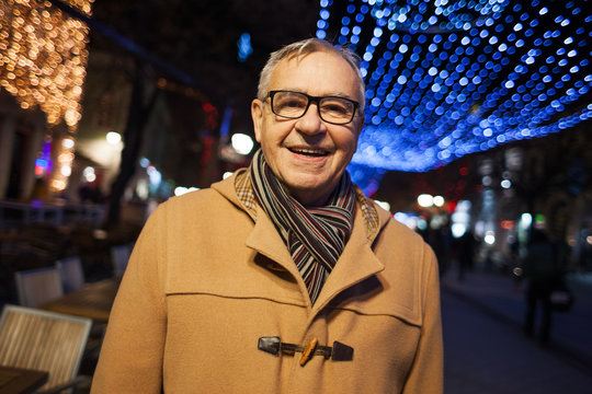 Outdoor Portrait Of Happy Senior Man In City. 