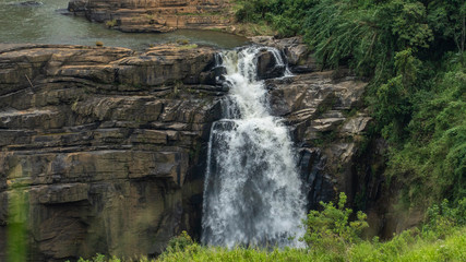 Waterfall And Green Grass