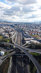 Aerial view of popular highway of Attiki Odos multilevel junction road, passing through National motorway, Attica, Greece