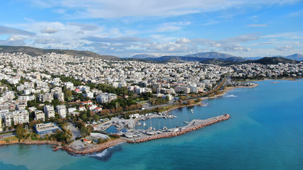 Aerial drone bird's eye view of small marina with boats docked in Voula, Athens riviera, Attica,...