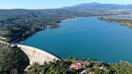Aerial drone photo of famous lake and dam of Marathon or Marathonas, North Attica, Greece