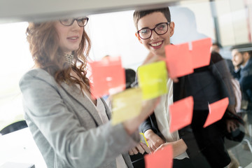 Creative business people working on business project in office