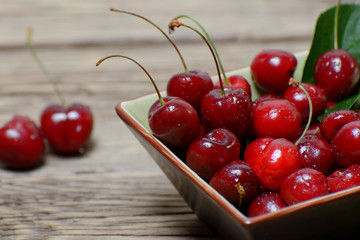 Cherries on a wooden table. Close-up.