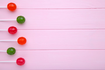 Lollipops on pink background. sweet candy concept