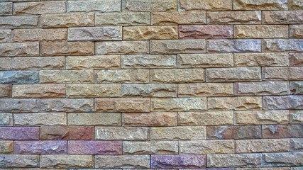 Sandstone brick wall.