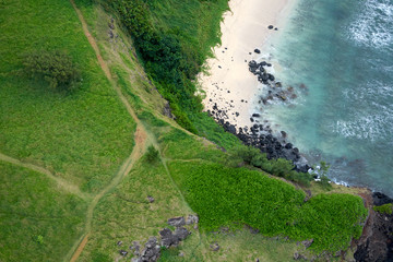 Hiking trail along the beach on the coast of the island of Mauritius.
