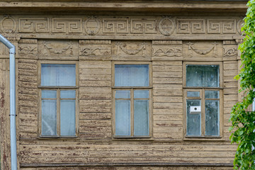 Obraz na płótnie Canvas Window of a old wooden house