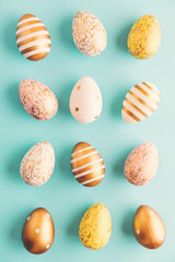 Easter Flat Lay Pattern of Eggs on turquoise