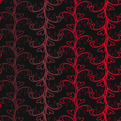 flower ornament with red hearts painted over a dark color