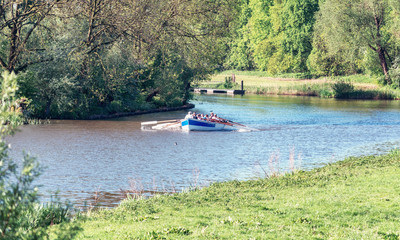 Fototapeta na wymiar Sloop in action on the river Linge in the Betuwe