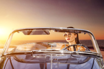 Summer car and slim young woman 