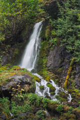 Fototapeta na wymiar waterfall in the mountains in autumn