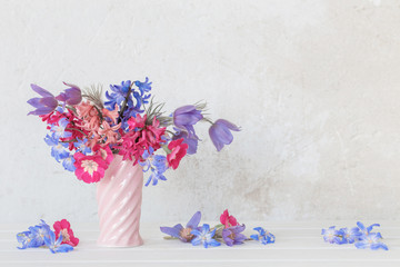 beautiful spring flowers in pink vase