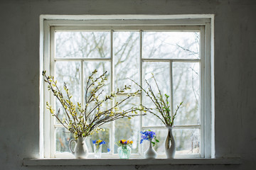 bouquet of flowers on the windowsill