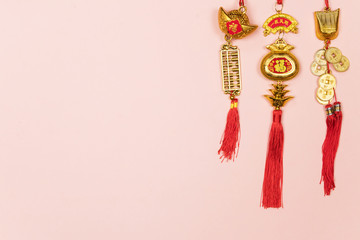 Happy Chinese New Year decoration on a pink background.  Amulet of wealth and lucky. Calligraphy mean rich.  Flat lay, Top view - Image.