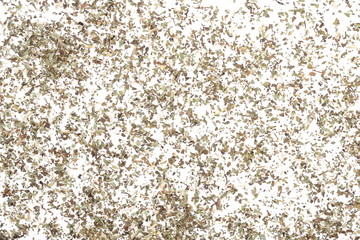 Pile of dried oregano leaves isolated on white background, top view