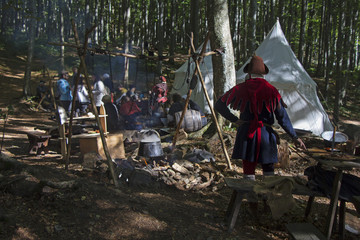 Medieval Camp in the forest cooking in the kettle