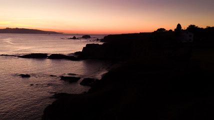 Fototapeta premium Aerial view of cliiffs at the sunset