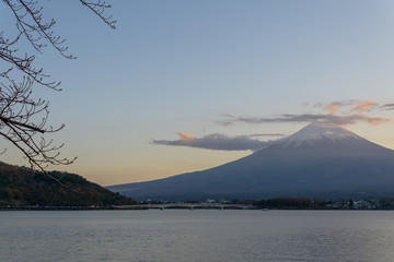 Dramatic sunset of Mount Fuji on lake