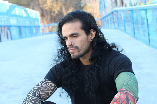 Young ethnic man feeling not that well 