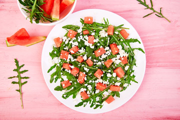 Fresh summer watermelon salad with feta cheese and arugula