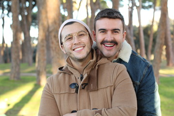 Beautiful homosexual couple in the park