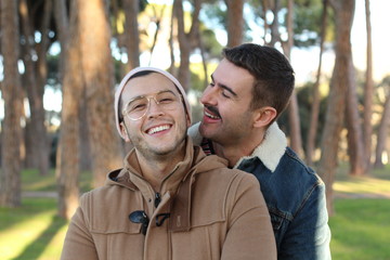 Romantic gay couple in the park