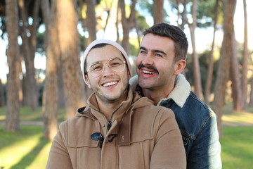 Fototapeta premium Trendy homosexual couple smiling outdoors